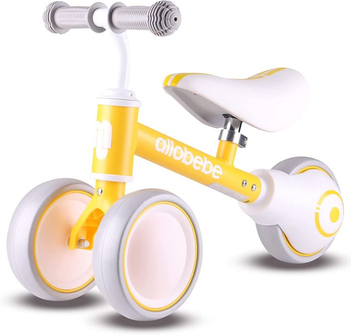 A yellow balance bike