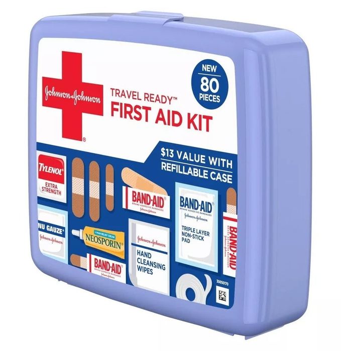 A side view of a light purple first aid kit, showcasing all of its contents inside