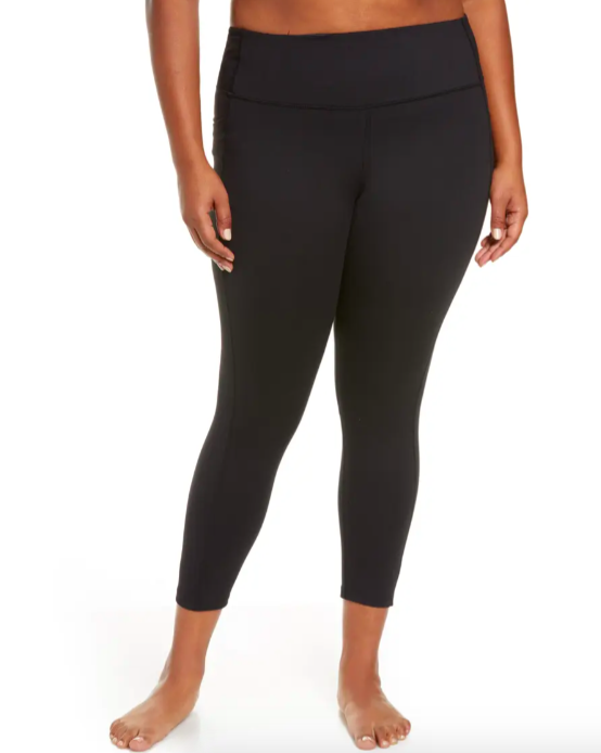 A model showcasing the leggings in a photo.