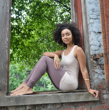 Model rocking the ruched ankle leggings with ease and style