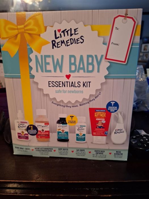 The Little Remedies New Baby Essentials Kit includes saline spray and drops, fever medicine, gripe water, honey cough syrup, diaper rash ointment, and gas relief drops.