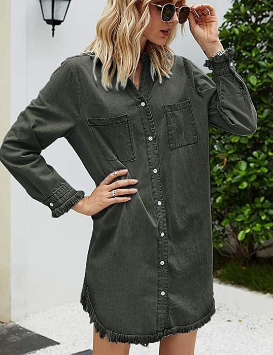 Model styling the denim dress in a trendy army green