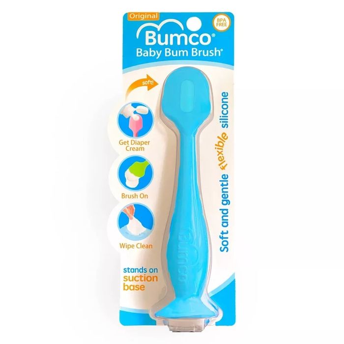Blue silicone bum brush in a white package