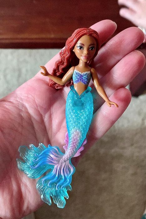 a charming little mermaid doll