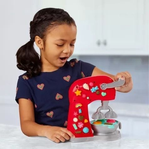 Child enjoying a Play-Doh set