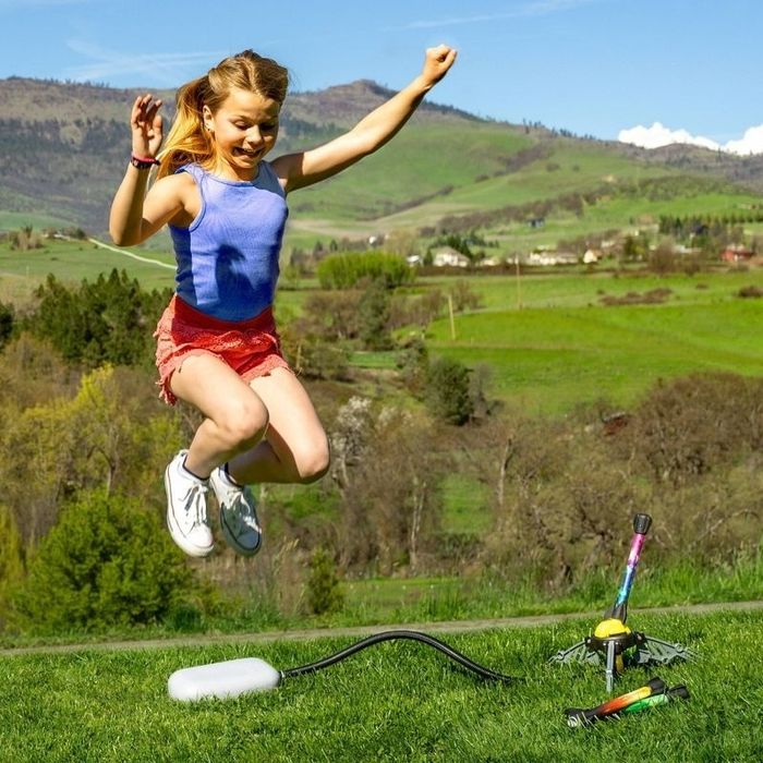 A child launches an air rocket