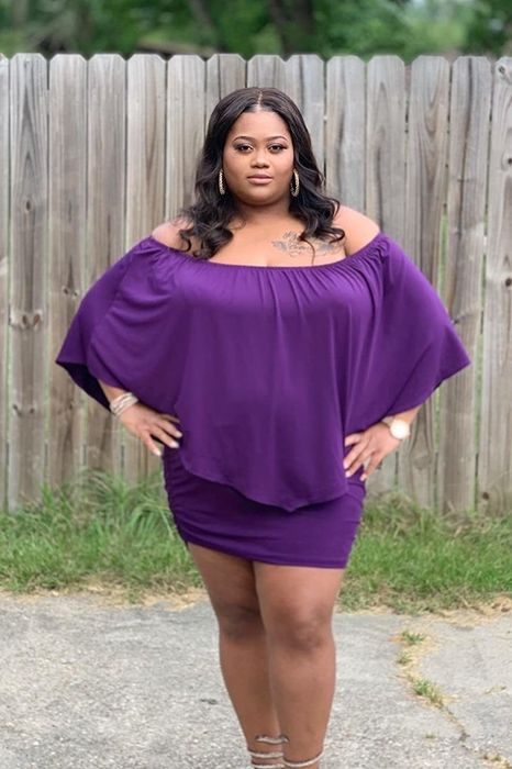 Reviewer in a purple dress