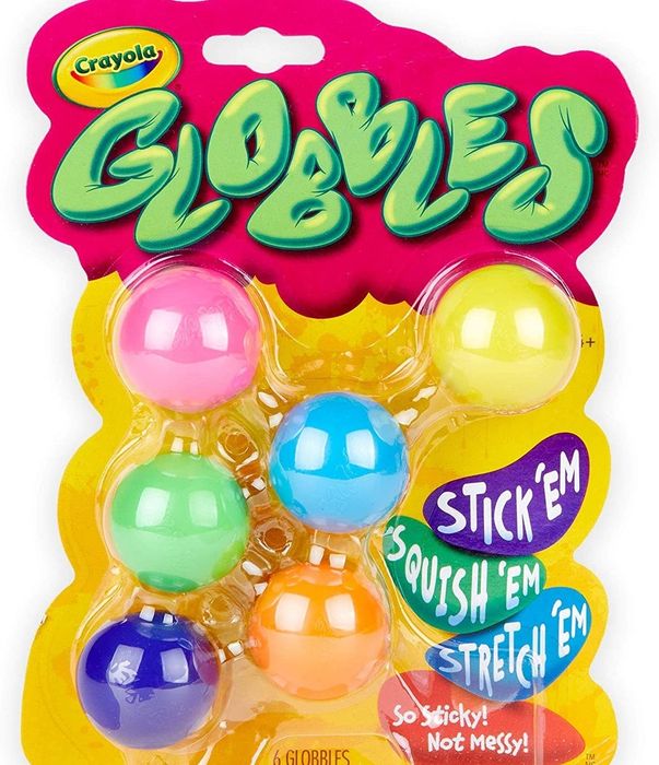 Six colorful balls in yellow packaging