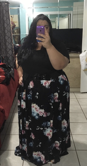 Reviewer in a version with a black top and a floral white-and-black bottom