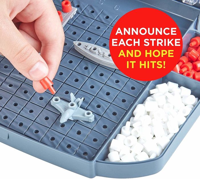 A close-up of a Battleship board game
