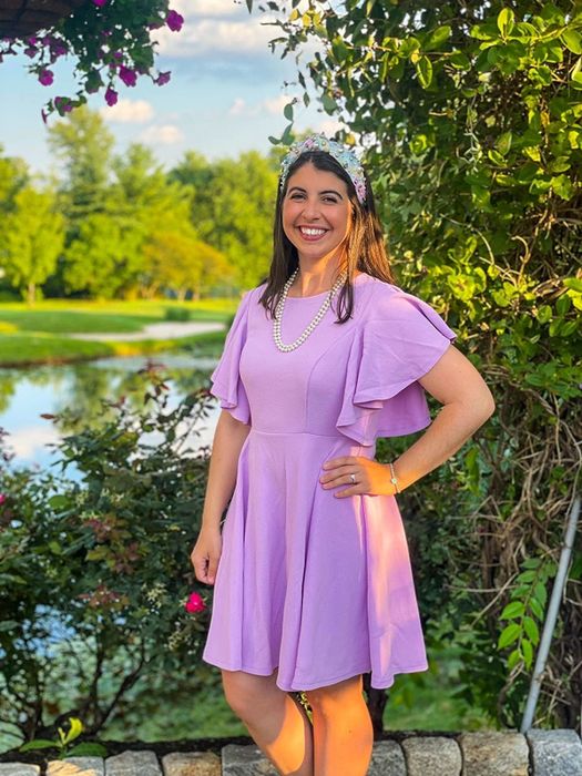 A reviewer rocking the dress in soft lilac