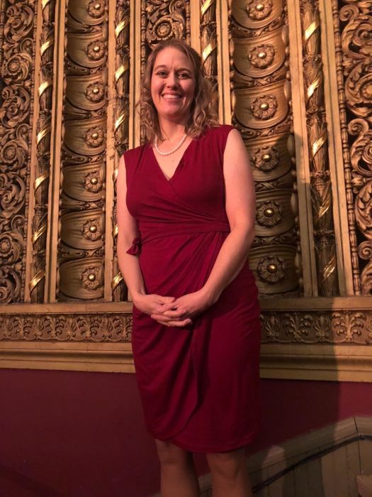 The dress in a deep maroon shade.