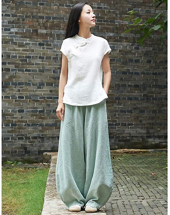 A model is wearing green pants.