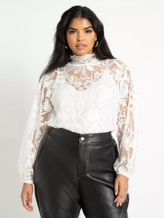 Model wearing the lace top in red