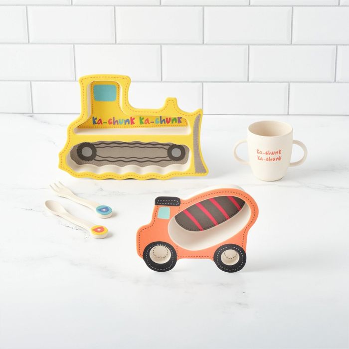Two construction truck-shaped plates designed for kids