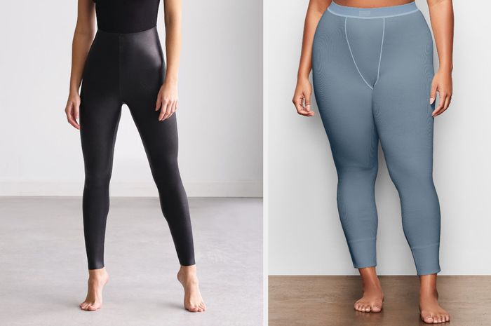 A model wearing black faux leather leggings, alongside another model in blue contrasting leggings against a gray background