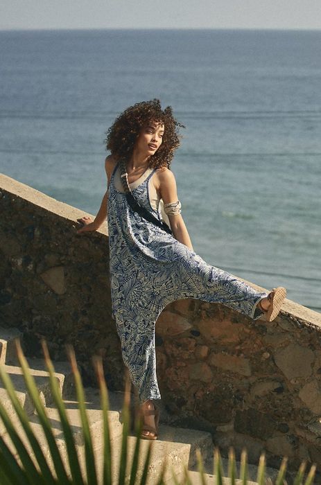 Model wearing a printed jumpsuit