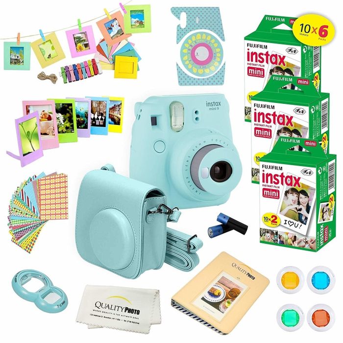 the light blue camera, film, and an assortment of accessories