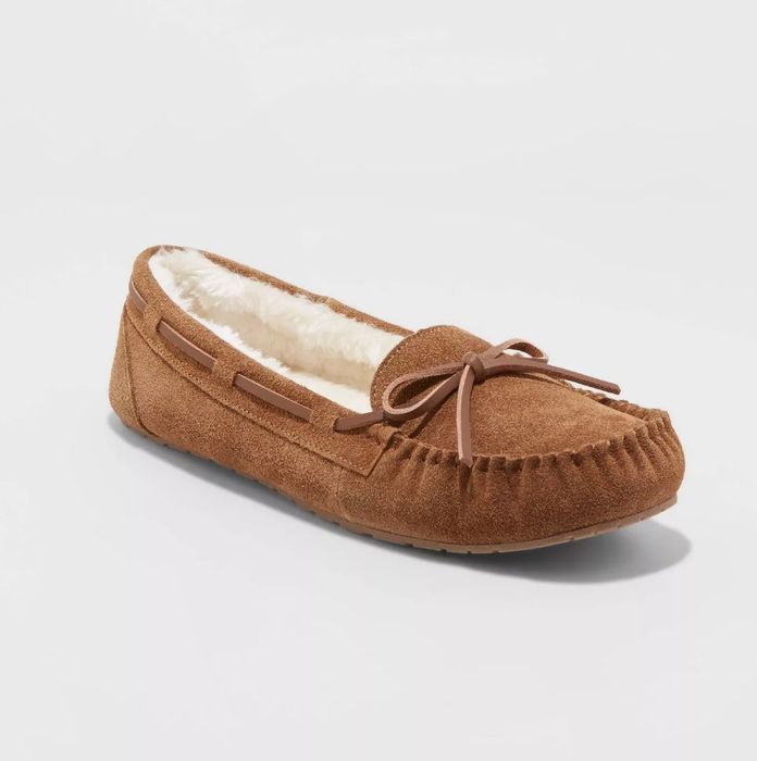 Moccasins in a warm tan suede color.