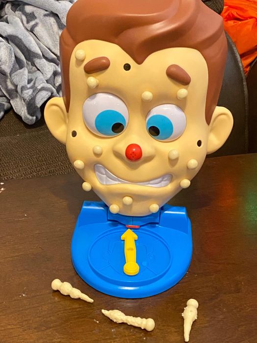 A close-up of the game with some pimples in place and ready to be popped