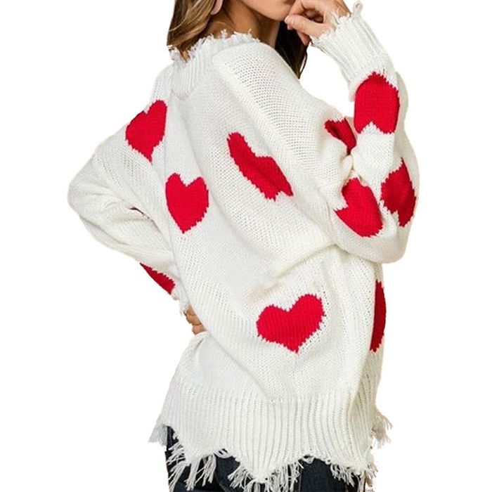 Image of model wearing a white sweater