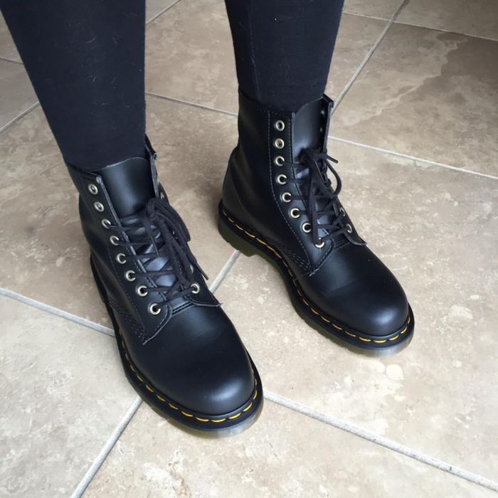 a customer photo of them wearing the black combat boots