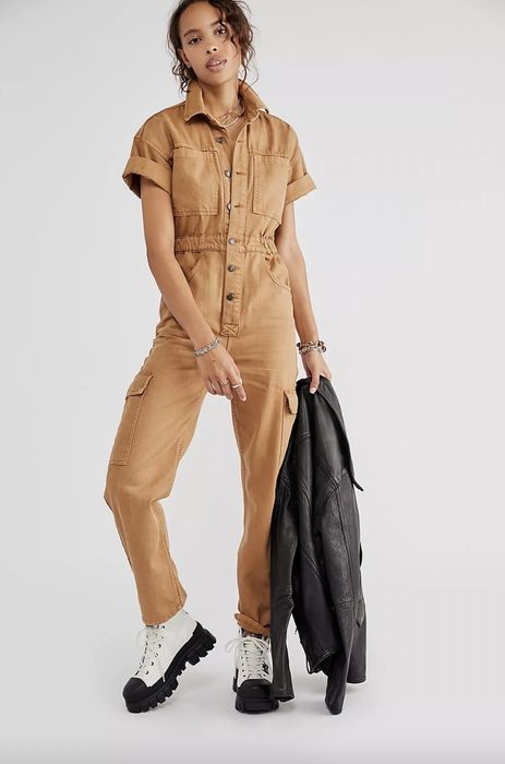 Model wearing a tan coverall