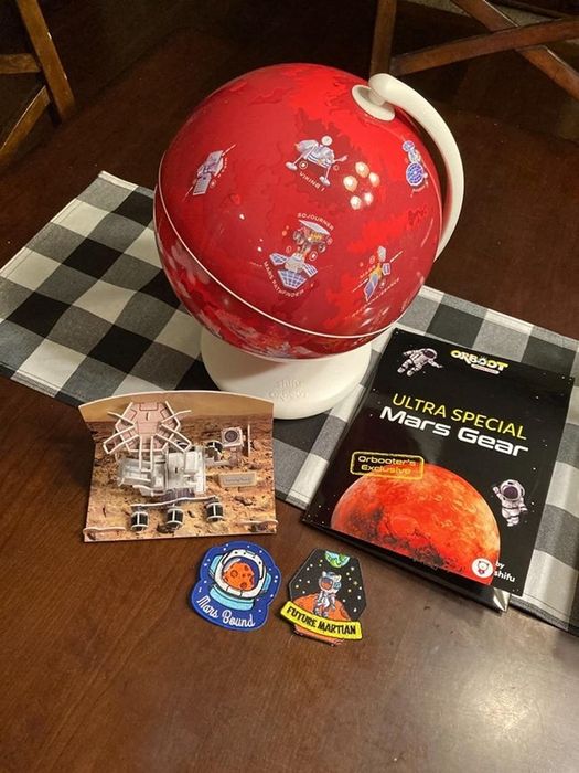 a reviewer photo of the Mars globe