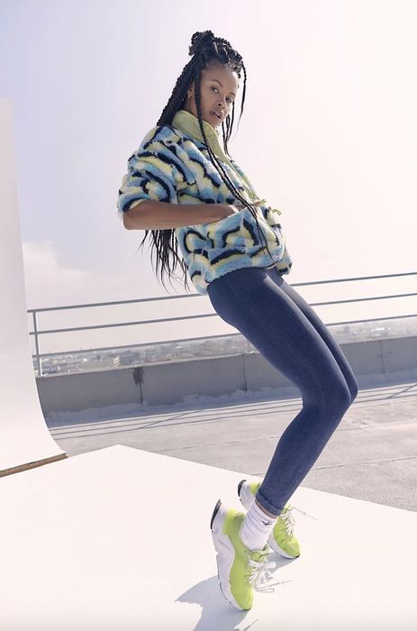 Model wearing a printed fleece jacket