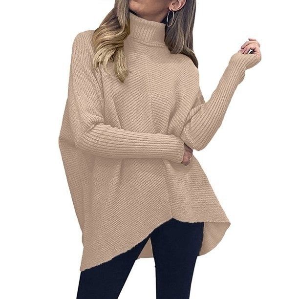 Photo of a model wearing a tan sweater