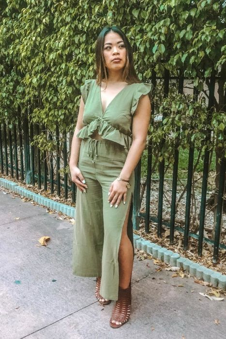 front view of another reviewer wearing the green version of the set