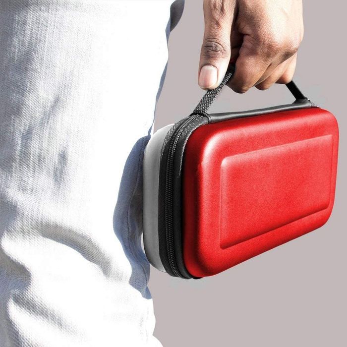 a person holding the case in red and white
