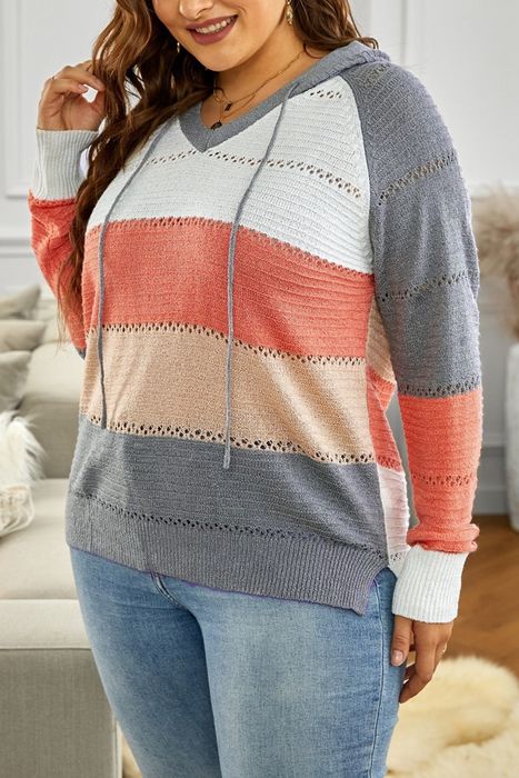 Image of model wearing a striped sweater