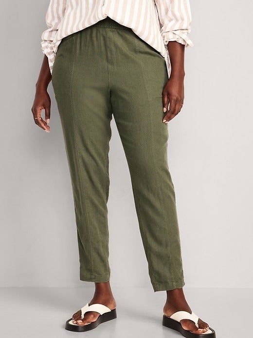 front view of a model wearing olive-colored pants