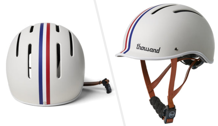Images showcasing a white helmet with a bold red, white, and blue stripe running down the middle