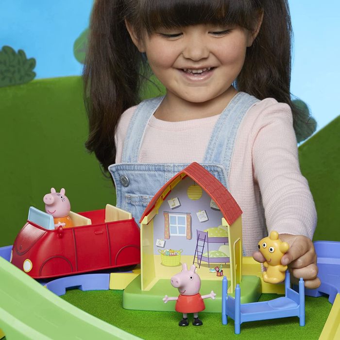 a child playing with the toy set
