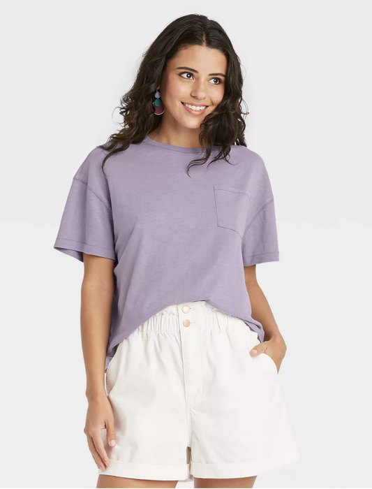 A model sports a soft purple shirt.