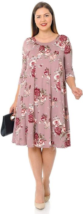 model dressed in pink with a floral print