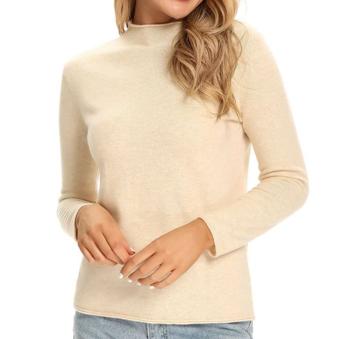 Image of model wearing a yellow sweater