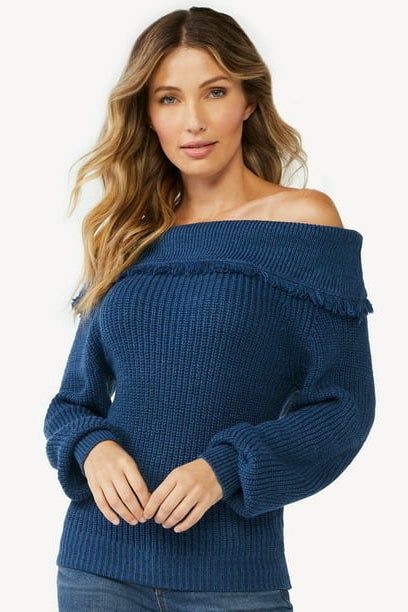 Photo of model wearing a blue sweater