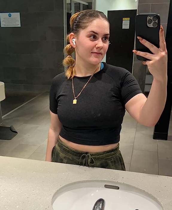 a reviewer rocking the crop top in black