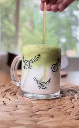 a TikTok video showing a drink being stirred in the Navi cup