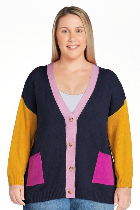 Image of model wearing a navy cardigan