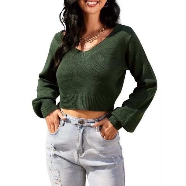 Photo of a model wearing a green sweater