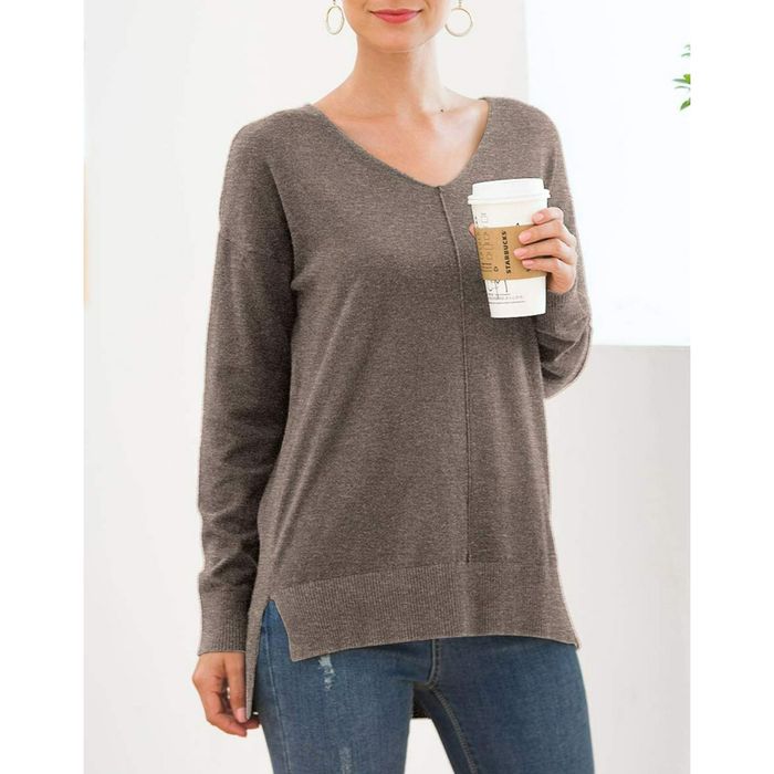 Photo of model wearing a brown sweater