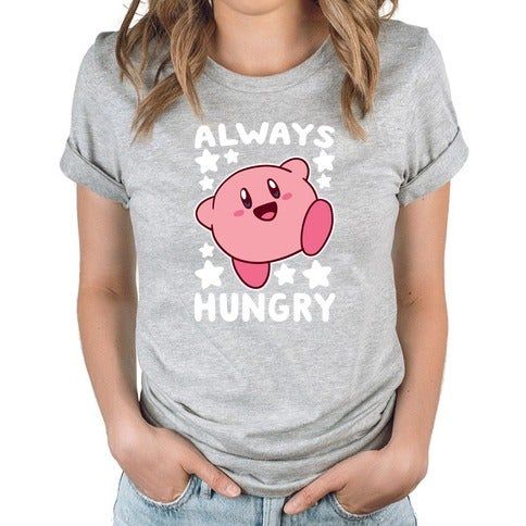 a grey shirt featuring Kirby with the text