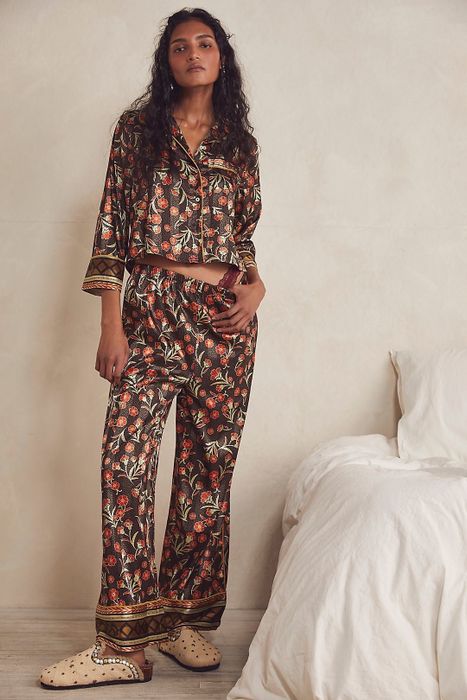 Model wearing brown floral pajamas