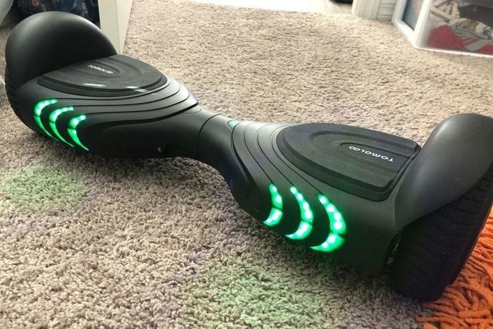 A photo of the reviewer's black and green hoverboard
