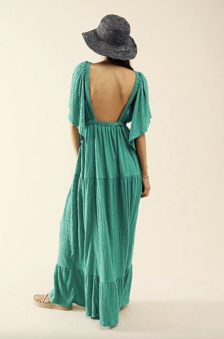 Back view of a green maxi dress