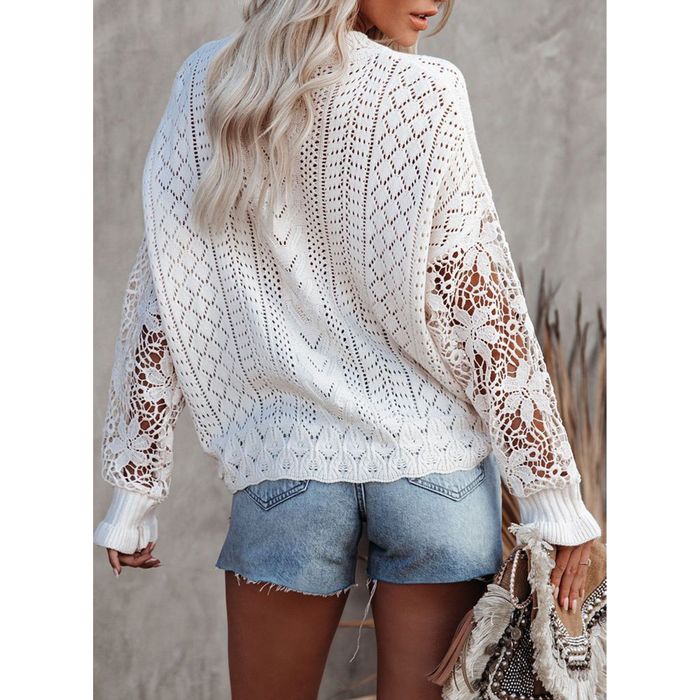 Image of model wearing a white sweater